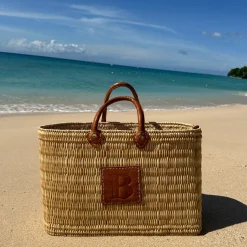 Reed basket with leather letter