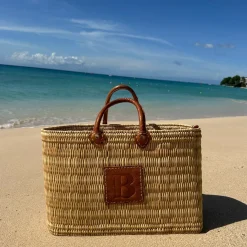 Reed basket with leather letter