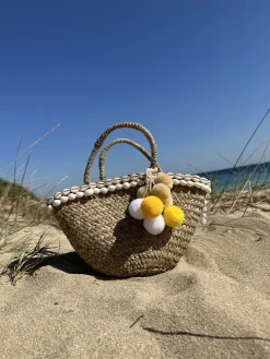 The Baby Bali Lemon Pom Pom Basket