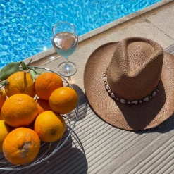The cowboy hat with shell band
