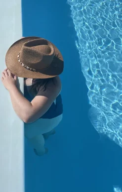 The cowboy hat with shell band